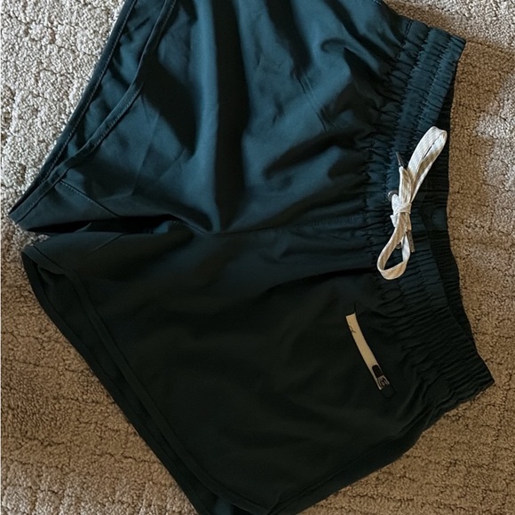 Vuori Women's DARK GREEN Clementine 2.0 shorts, 2.5” - Picture 3 of 6